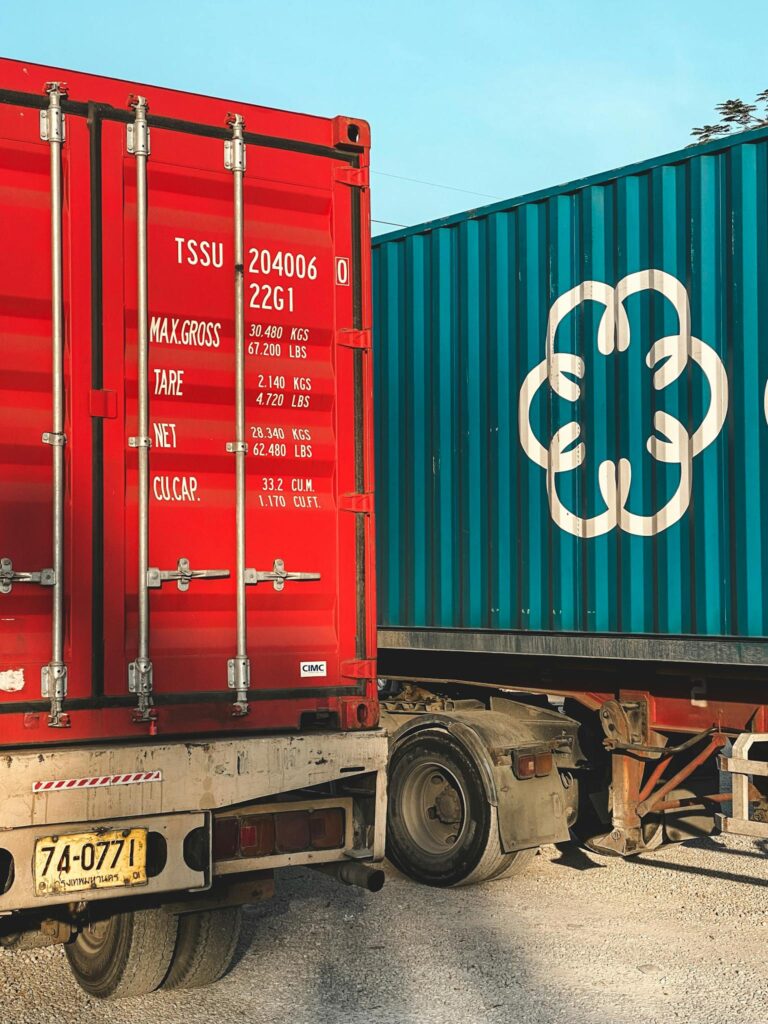 Colorful cargo trucks with containers in Chiang Mai, Thailand, showcasing logistics.